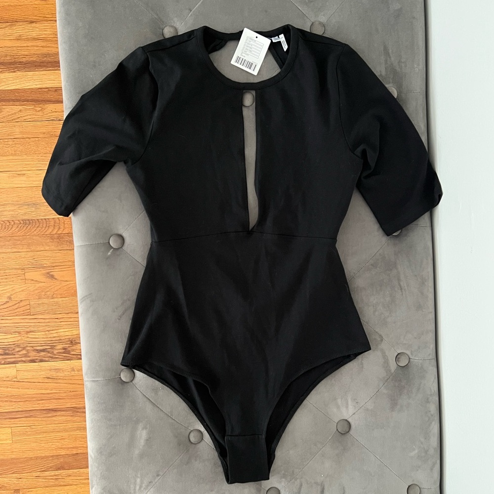 NWT Out from under body suit!